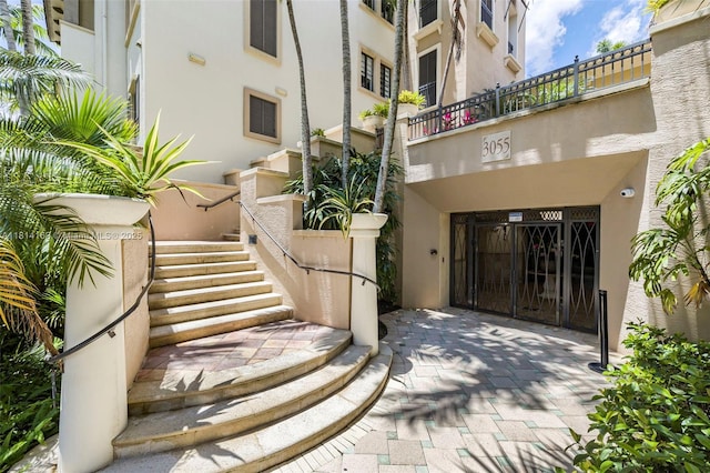 3055 NW 126th Ave Unit 303, Sunrise, FL 33323 - view of building exterior featuring stairway