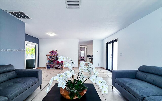 14751 SW 158th St, Miami, FL 33187 - living area with light tile patterned floors