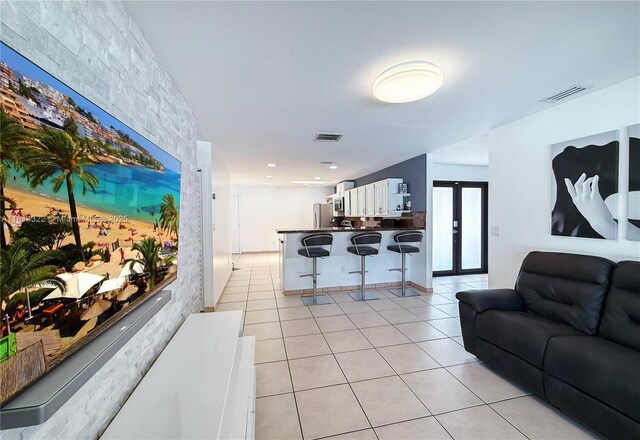 14751 SW 158th St, Miami, FL 33187 - living area with light tile patterned flooring
