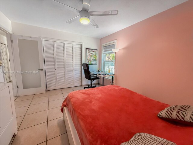 14751 SW 158th St, Miami, FL 33187 - bedroom with light tile patterned floors, a closet, a ceiling fan, and a desk