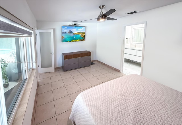 14751 SW 158th St, Miami, FL 33187 - bedroom with light tile patterned floors, baseboards, and a ceiling fan