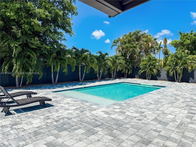 14751 SW 158th St, Miami, FL 33187 - view of pool with a patio