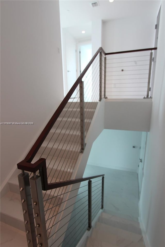 1080 Brickell Ave Unit 1409, Miami, FL 33131 - stairs featuring recessed lighting and baseboards