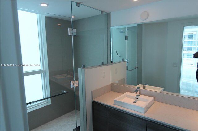 1080 Brickell Ave Unit 1409, Miami, FL 33131 - full bath featuring vanity, a stall shower, and recessed lighting
