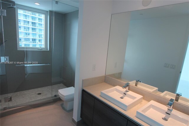 1080 Brickell Ave Unit 1409, Miami, FL 33131 - full bath with toilet, double vanity, and a stall shower