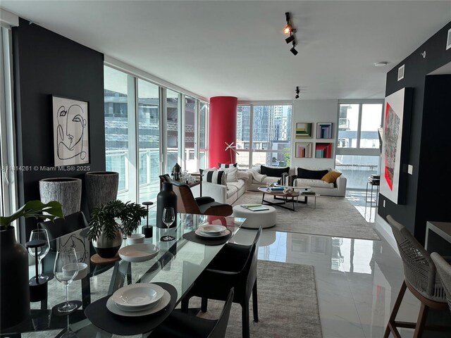 1080 Brickell Ave Unit 1409, Miami, FL 33131 - dining space with a wall of windows and marble finish floors