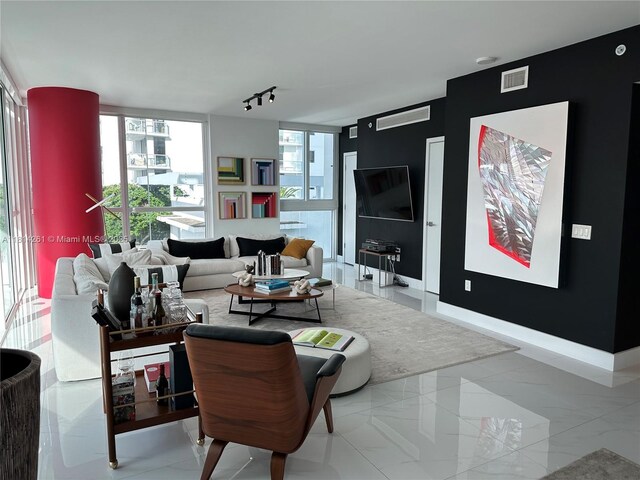 1080 Brickell Ave Unit 1409, Miami, FL 33131 - living room featuring plenty of natural light and marble finish flooring