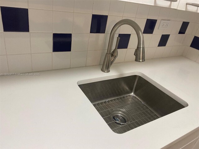 1500 Bay Rd Unit 1274S, Miami Beach, FL 33139 - kitchen view of a sink and decorative backsplash