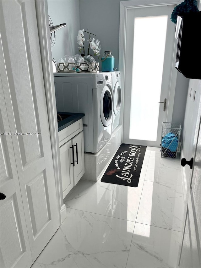 4248 SW 185th Ave, Miramar, FL 33029 - laundry room with washing machine and clothes dryer and marble look tile flooring