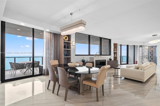 18555 Collins Ave Unit 2105, Sunny Isles Beach, FL 33160 - dining area with a wall of windows and recessed lighting