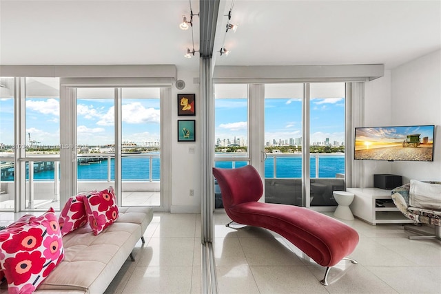 540 W Ave Unit 914, Miami Beach, FL 33139 - living area featuring plenty of natural light and dark aggregate flooring