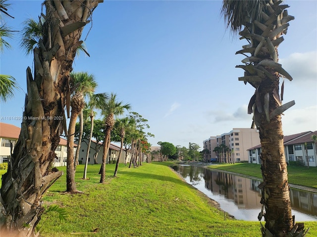 4820 W Lucerne Lakes Blvd W Unit 305, Lake Worth, FL 33467 - view of community with a water view, a yard, and a residential view