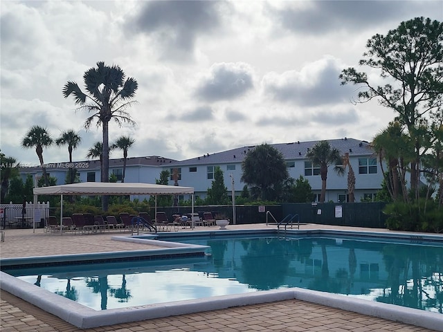 4820 W Lucerne Lakes Blvd W Unit 305, Lake Worth, FL 33467 - community pool featuring a patio