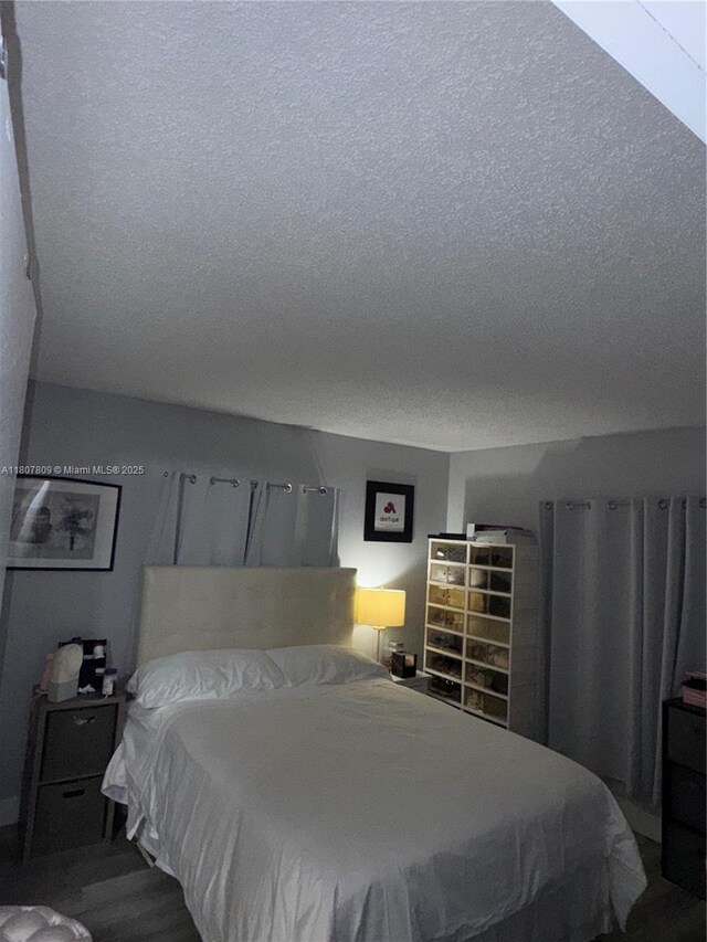 8260 SW 210th St Unit 310, Cutler Bay, FL 33189 - bedroom with a textured ceiling