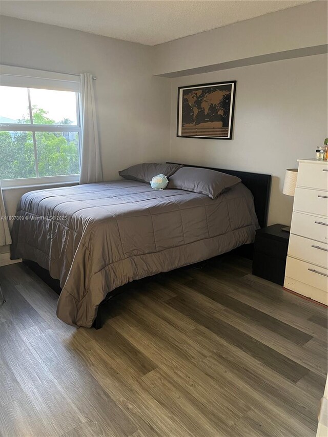 8260 SW 210th St Unit 310, Cutler Bay, FL 33189 - bedroom featuring wood finished floors