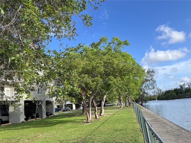 8260 SW 210th St Unit 310, Cutler Bay, FL 33189 - surrounding community with a water view and a lawn
