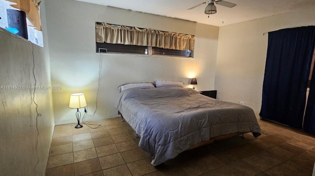 3390 SW 15th Ct, Fort Lauderdale, FL 33312 - tiled bedroom with a ceiling fan