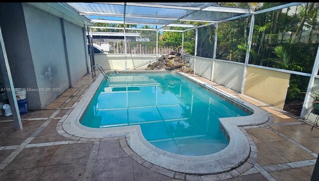 3390 SW 15th Ct, Fort Lauderdale, FL 33312 - view of pool featuring a patio area and a lanai