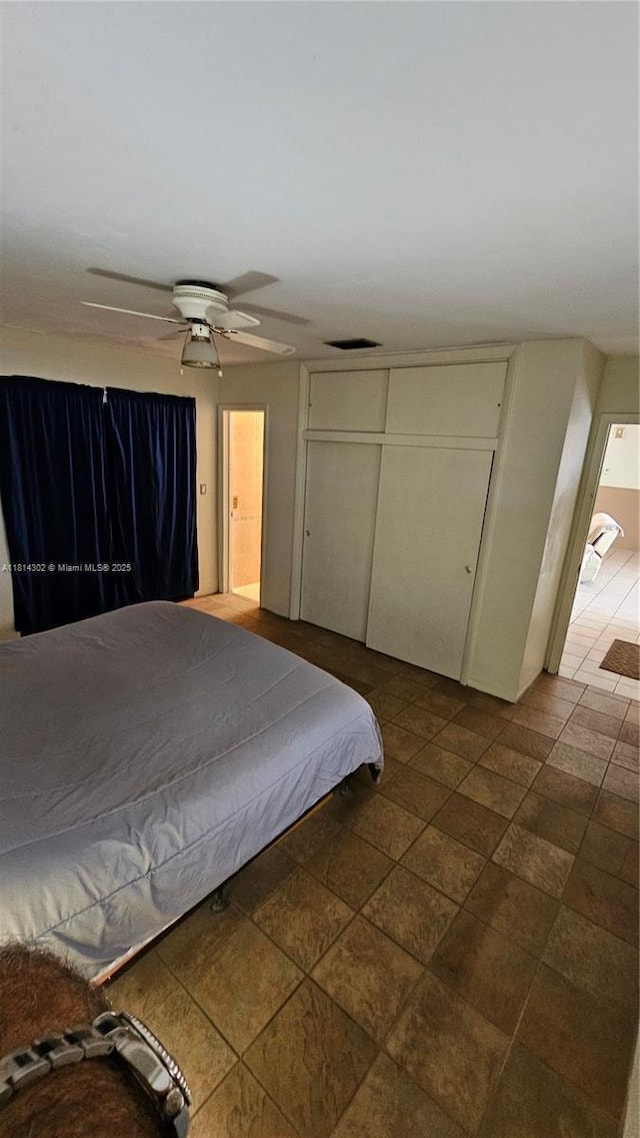 3390 SW 15th Ct, Fort Lauderdale, FL 33312 - bedroom featuring a ceiling fan and a closet