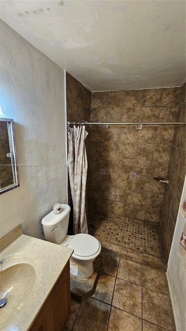 3390 SW 15th Ct, Fort Lauderdale, FL 33312 - bathroom featuring vanity, tiled shower, and a textured wall