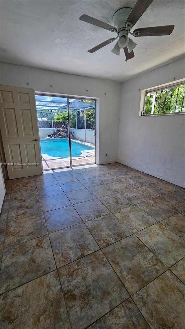 3390 SW 15th Ct, Fort Lauderdale, FL 33312 - empty room with a ceiling fan and a sunroom