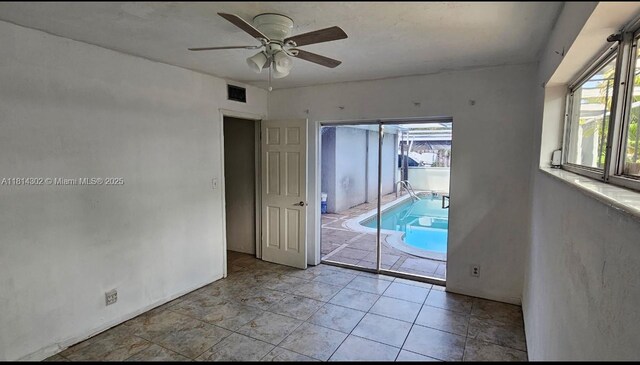 3390 SW 15th Ct, Fort Lauderdale, FL 33312 - spare room featuring a ceiling fan