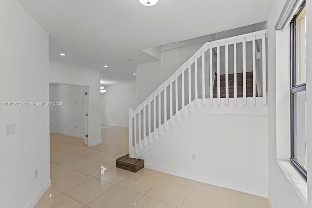 3502 W 86th Ter, Hialeah, FL 33018 - stairway featuring baseboards, tile patterned floors, and recessed lighting