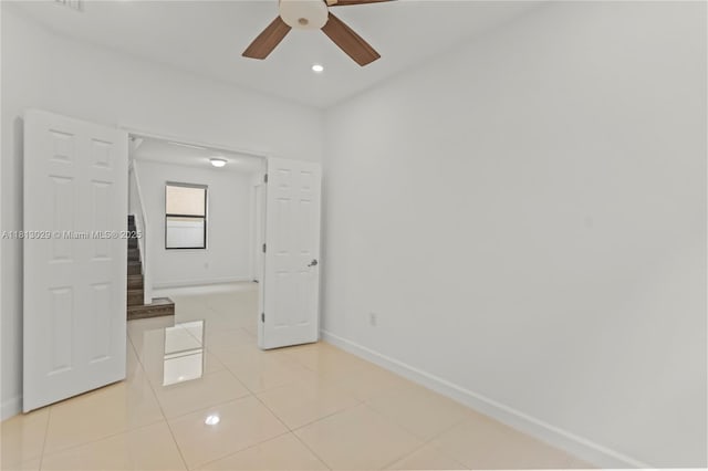 3502 W 86th Ter, Hialeah, FL 33018 - empty room featuring ceiling fan, light tile patterned floors, and baseboards