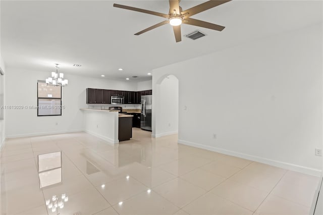 3502 W 86th Ter, Hialeah, FL 33018 - unfurnished living room featuring baseboards, a chandelier, a ceiling fan, light tile patterned floors, and recessed lighting