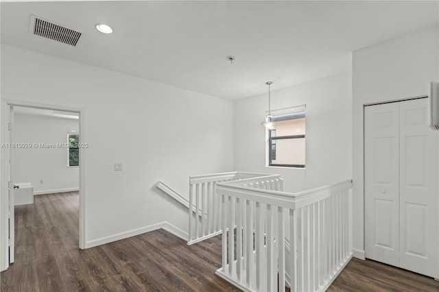 3502 W 86th Ter, Hialeah, FL 33018 - hallway with an upstairs landing, dark wood-style flooring, baseboards, and recessed lighting