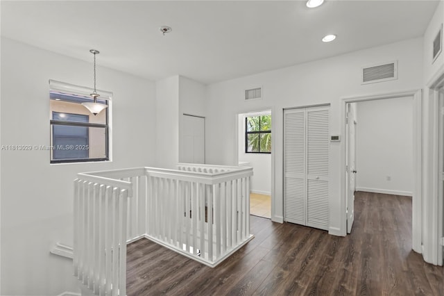 3502 W 86th Ter, Hialeah, FL 33018 - corridor with an upstairs landing, dark wood-type flooring, recessed lighting, and baseboards