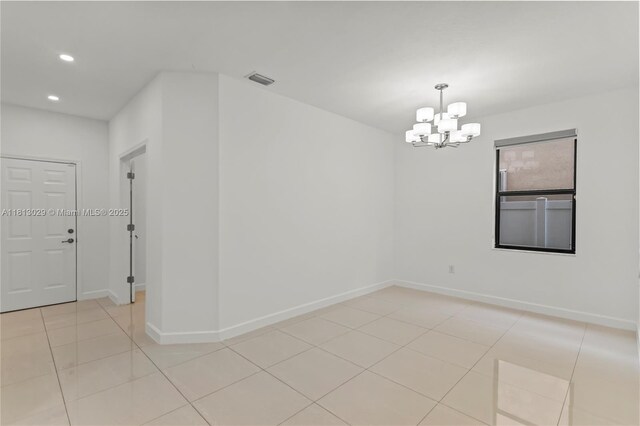 3502 W 86th Ter, Hialeah, FL 33018 - unfurnished room featuring a chandelier, baseboards, recessed lighting, and light tile patterned flooring