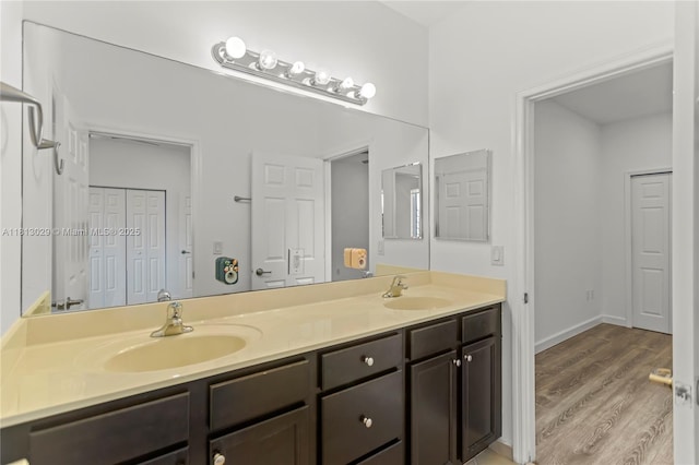 3502 W 86th Ter, Hialeah, FL 33018 - full bath featuring double vanity and wood finished floors