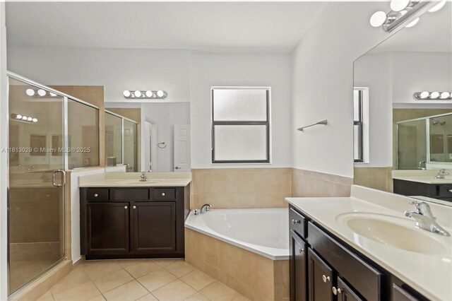 3502 W 86th Ter, Hialeah, FL 33018 - full bath featuring tile patterned floors, a shower stall, and two vanities