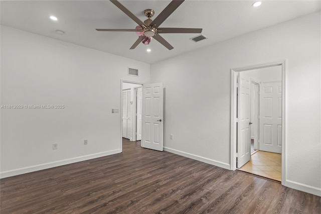 3502 W 86th Ter, Hialeah, FL 33018 - unfurnished bedroom with dark wood-style flooring, recessed lighting, baseboards, and ceiling fan