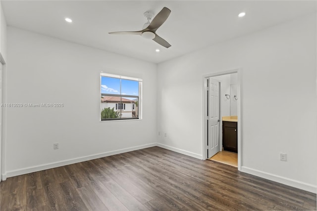 3502 W 86th Ter, Hialeah, FL 33018 - unfurnished bedroom with dark wood-style flooring, baseboards, recessed lighting, ensuite bath, and ceiling fan