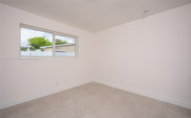 6640 SW 7th St, Pembroke Pines, FL 33023 - spare room featuring a smoke detector and light tile patterned floors