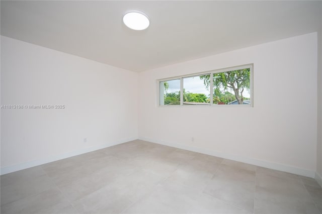 6640 SW 7th St, Pembroke Pines, FL 33023 - spare room featuring baseboards