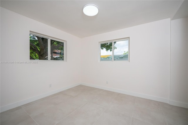 6640 SW 7th St, Pembroke Pines, FL 33023 - unfurnished room featuring baseboards and light tile patterned floors