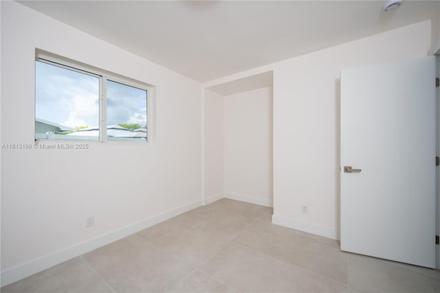 6640 SW 7th St, Pembroke Pines, FL 33023 - spare room with a smoke detector and light tile patterned floors