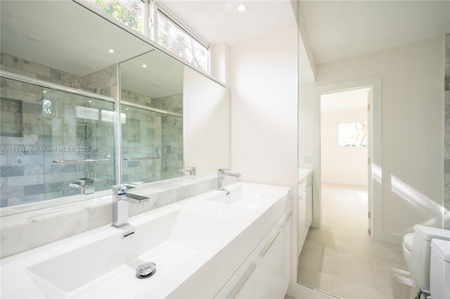 6640 SW 7th St, Pembroke Pines, FL 33023 - bathroom featuring double vanity and a stall shower