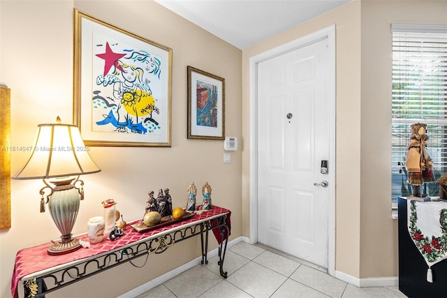 16316 SW 48th St, Miramar, FL 33027 - foyer entrance featuring baseboards and light tile patterned floors