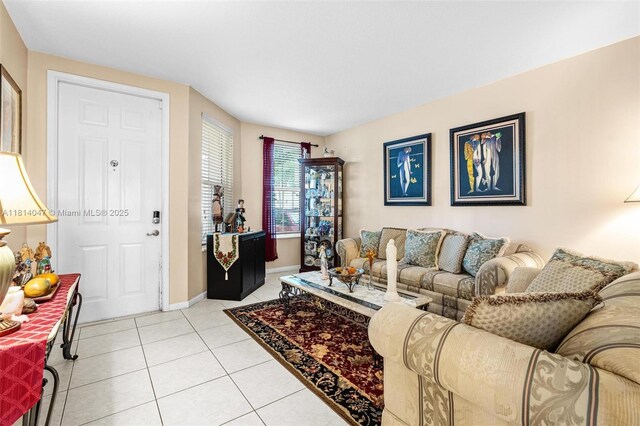 16316 SW 48th St, Miramar, FL 33027 - living room featuring light tile patterned floors and baseboards