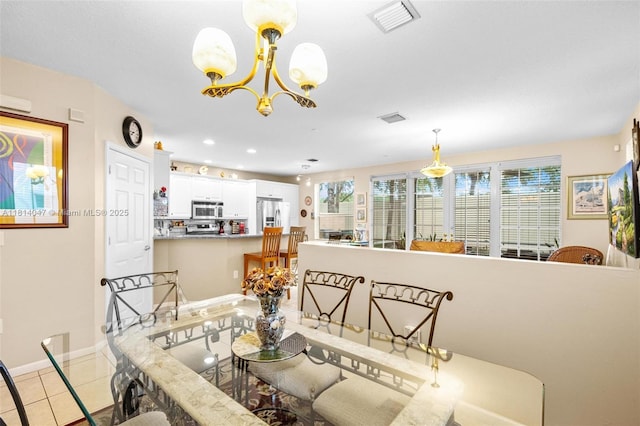 16316 SW 48th St, Miramar, FL 33027 - dining room featuring a chandelier, light tile patterned flooring, baseboards, and recessed lighting