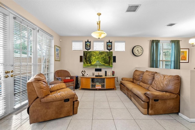16316 SW 48th St, Miramar, FL 33027 - living area featuring light tile patterned floors and baseboards