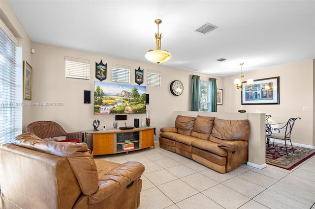 16316 SW 48th St, Miramar, FL 33027 - living area with a chandelier, healthy amount of natural light, and light tile patterned floors