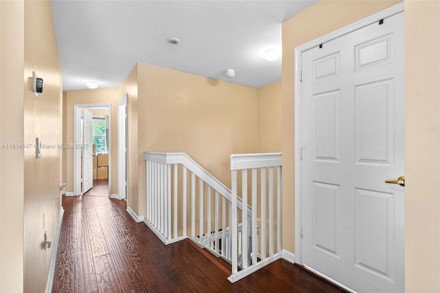16316 SW 48th St, Miramar, FL 33027 - hallway with an upstairs landing, hardwood / wood-style flooring, and baseboards