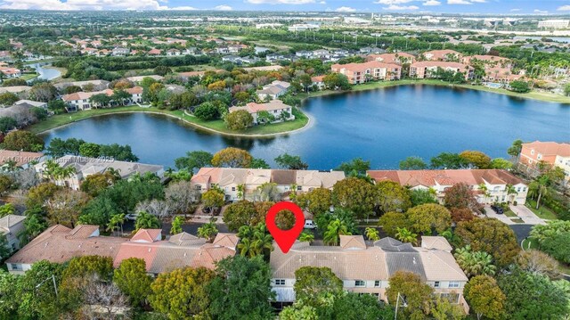 16316 SW 48th St, Miramar, FL 33027 - aerial view of property and surrounding area with nearby suburban area and a large body of water