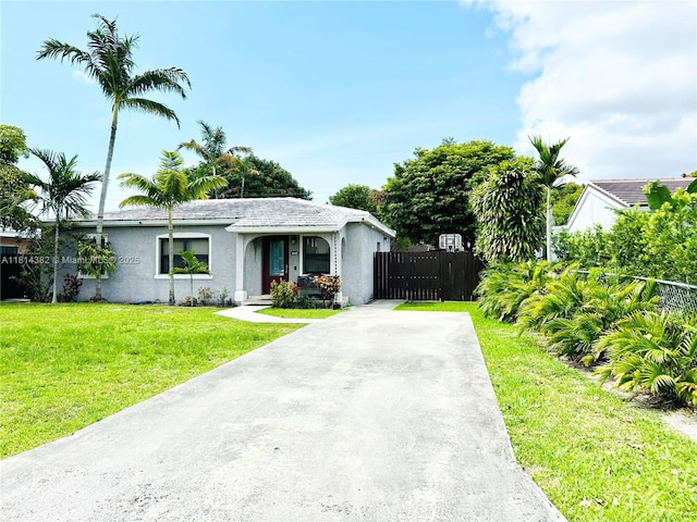 7420 SW 34th Ter, Miami, FL 33155 - view of front of home featuring stucco siding and driveway