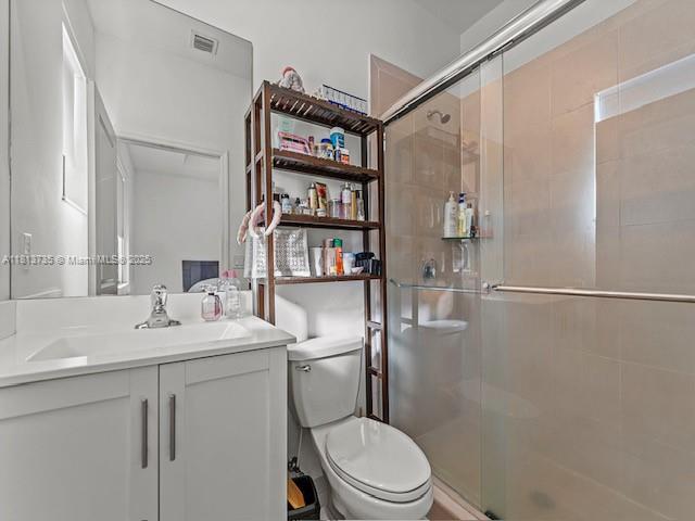 18058 SW 147th Ct, Miami, FL 33187 - full bathroom with a stall shower and vanity